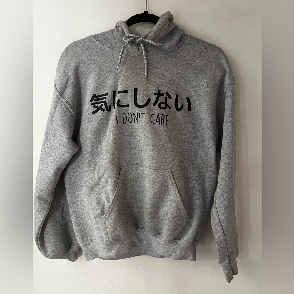 Grey “I Don’t Care” (Japanese & English) hoodies, size S. Great condition.
